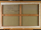 a picture of a painting on a easel with writing on it