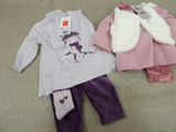 two clothing items that include a pink coat, purple pants, and a white vest