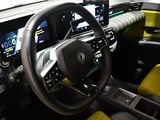 the interior of a car with a steering wheel, dashboard, and dash board