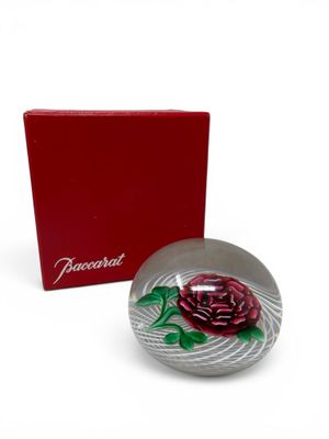 the box is red and white with a rose on it