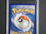 a close up of a pokemon card in a plastic case