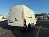 a white van that is parked in a parking lot