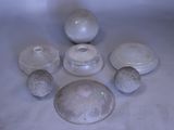 a group of glass objects sitting on a table
