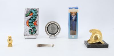 many different items that are sitting on a white surface