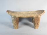 an old wooden bench with a curved top on a white background