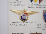a lot of badges on a piece of paper