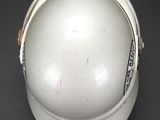 an image of a white helmet sitting on top of a black table