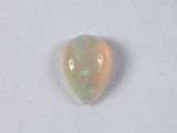 a white oplite stone on a white surface