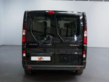 a black van that is parked inside of a building