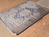 a rug on the floor that has a design on it