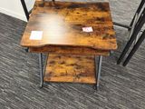 a small table with two small tables on top of it