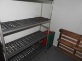 a metal shelving with shelves in a room