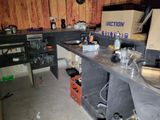 an image of a kitchen with a lot of clutter on the counter