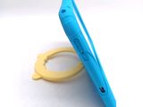 a blue cell phone sitting on top of a yellow ring
