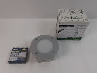 a light that is sitting on a table next to a box