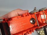a person holding a toy gun in their hand