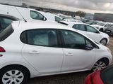 a lot of cars parked in a parking lot