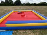 an inflatable pool in the middle of a field
