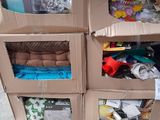 cardboard boxes stacked on top of each other in a room