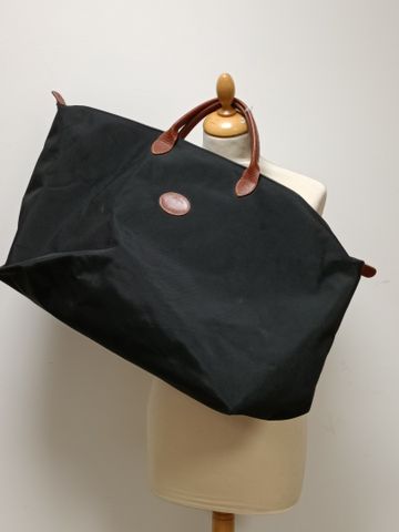 LONGCHAMPS – Sac de voyage en toile grainé noir, intérieur plasti