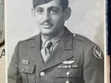 an old photo of a man in a military uniform