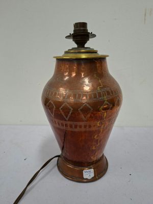 a lamp that is sitting on a white table