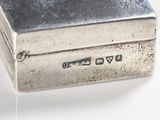 a silver box that is sitting on a table