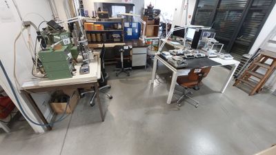 an image of a room with a lot of work equipment
