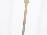 sculpture of a metal arrow on a metal base on a white background