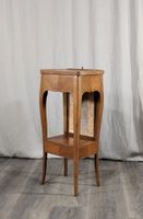 Petite table volante en placage de bois de rose, présente un…