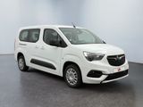 the white van is parked in a large room