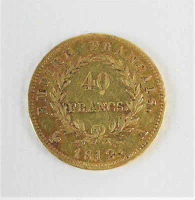 l'image d'une pièce d'or sur laquelle figure le chiffre 40