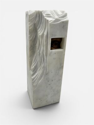marble sculpture of a woman ' s face with flowing hair