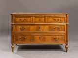 an antique chest of drawers with a marble top