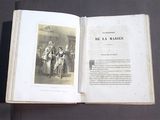 an open book with a picture of a man and a woman on it