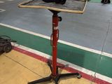 an image of a table that is on a stand in a warehouse