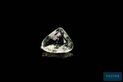 a green and white diamond on a black background
