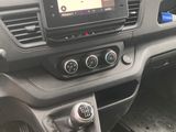 a car dashboard with a tablet on the dashboard