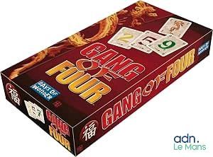 the box is full of playing cards and a card game