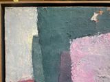 a painting that is in a wooden box on a table