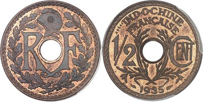 a close up of a coin with a design on it