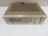 a close up of a radio on a white table