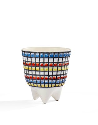an image of a colorful bowl on a white surface