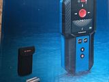 the box of the bosch professional laser measurer is open on the floor