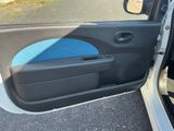 a car door with the door handle open and the door handle open