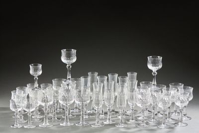 a lot of wine glasses that are sitting on a table