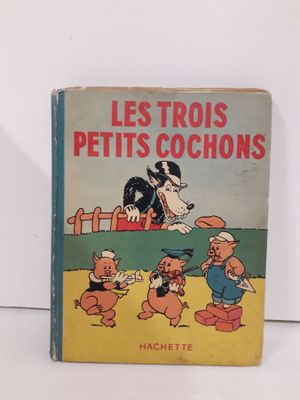 un vieux livre pour enfants avec une illustration représentant un chien et d'autres personnages de dessins animés