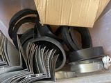 a lot of different types of headphones on a shelf