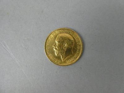 a gold coin with a picture of a man on it