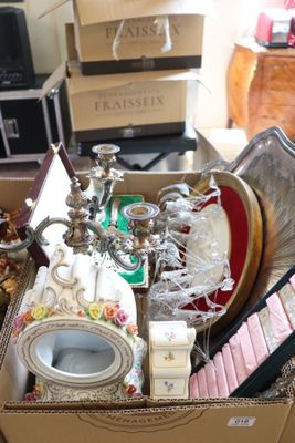 a box full of assorted items sitting on a table